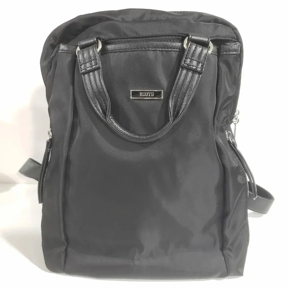 Roots Black Canvas Traveling Backpack.